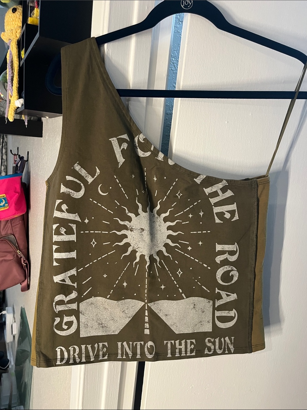 Grateful For The Road Olive One-Shoulder Graphic Crop Top